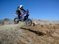 FlyinGo!!!!! jumps a berm