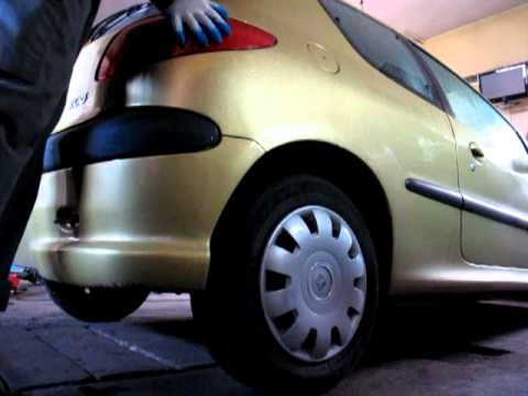 tylna belka Peugeot 206 skrzypi