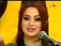 a beautiful arabic girl singing a traditional folk music