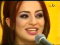 a beautiful arabic girl singing a traditional folk music