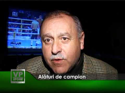 Alături de campion