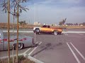 toyota on airbags three wheeling in a parking lot