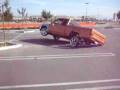 toyota on airbags three wheeling in a parking lot by double down custom