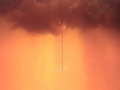 this video was created by filmaker tony comley and uses a section of music from alexander's annexe - 'push door to exit' (released 2006 on warp).  alexander's annexe is a collaboration between mira calix, david sheppard (of the london sinfonietta) and sarah nicolls.

http://www.warprecords.com/?news=1223
http://bleep.com/?bleep=warpcdd152

mira calix's upcoming album 'the elephant in the room: 3 commissions' will be released 27th oct 2008 on warp.
more info: http://www.warprecords.com/?news=1445 


some further info on the video:

