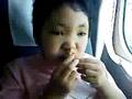 Azusa eats a sandwich in the bullet train (Japan)
