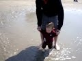 Grayson wading in a tide pool at the North Sea