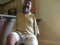 Man playing guitar with foot