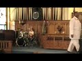 Bishop applauds Micah for drumming