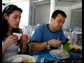 Ernani Appratto e Wilson Paim comendo tainha assada