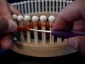 Knitting Pinwheels on Loom: Part IV