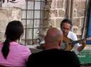 oud and violin player yair dalal plays for several guests in yaffa.