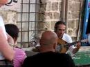 oud and violin player yair dalal plays for several guests in yaffa.