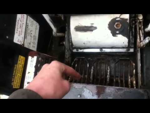 how to drain hydraulic oil on bobcat