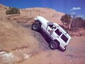 Jeep Cherokee succesfully climbing Dump Bump in Moab