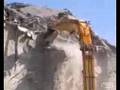 Démolition en hauteur d'anciens silos de cimenterie