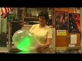dr  altman popping a balloon with a laser