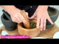 Using a pestle and mortar