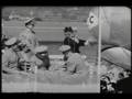Mrs Bess Truman trying to christen C-54 plane