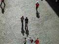 Covent Garden Piazza with sunshine tourists and shadows