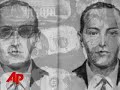 a torn and tangled parachute found by children in southwest washington state may belong to famed hijacker d.b. cooper, who jumped out of a jetliner in 1971 with $200,000 in cash, never to be seen again. (march 26)