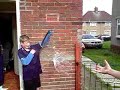 water balloon being popped with paper in slow motion water balloon being popped with paper in slow motion