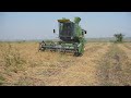 Rice harvesting with john deere 1055