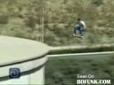 Crazy dude jumps water towers