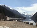 Motorcycle ride through a snow avalanche at Duffey Lake, BC. by VRIDETV