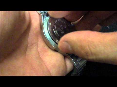 how to change battery on mk watch