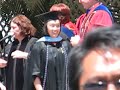 Graduate flashes the Shocker at graduation Graduate flashes the Shocker at graduation