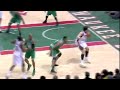 Milwaukee Bucks' Andrew Bogut gives Boston Celtics' Big Baby Glenn Davis a Major Facial