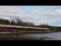 60163 Tornado and 66152 haul the 1Z29 08:06 London Paddington to Plymouth 'Cathedrals Express' along the banks of the River Teign at Luxtons Steps on Saturday 10th March 2012 Filmed using a Canon EOS 5D MkII