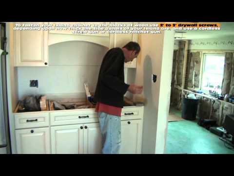 how to fasten a kitchen island to the floor