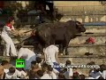 Click here to watch this video A mad bull jumps to the public!!!!!!