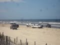 Chevy Tahoe or Suburban gets pulled out of sand by Ford F-350 Diesel OBX