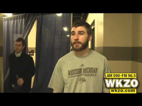 Senior Defenseman Luke Witkowski talks with Carolyn Binder after his final regular season home game, a shootout loss to Notre Dame Senior Defenseman Luke Witkowski talks with Carolyn Binder after his final regular season home game, a shootout loss to Notre Dame