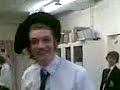 tom blind folded, playing marco polo, trying to find adam, malcolm and michael.