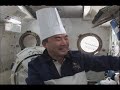 In a live interview with Japan's Fuji TV, Japan Aerospace Exploration Agency astronaut and Expedition 22 Flight Engineer Soichi Noguchi demonstrates his love for cooking aboard the International Space Station with the first hand-rolled sushi in space (with salmon).