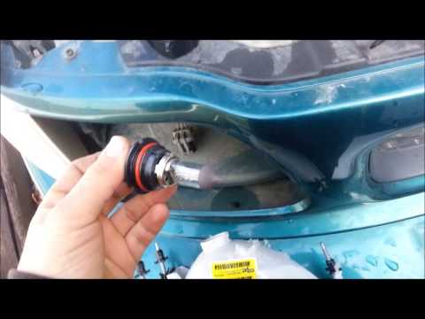 how to adjust headlights on a ford f 150