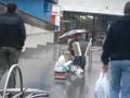 Man playing an accordian outside of a Metro Station in Mosco