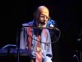 Allen Ginsberg on stage at megatripolis
