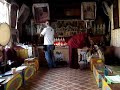 BHUDDIST MONKS PERFORMING POOJA IN SOMEONES HOUSE