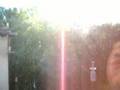 Squirrel jumping onto bird feeder