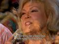 a touching song about god's love, sung by bill & gloria gaither and wesley pritchard