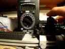 Hornby motor from a Hymek trying to find the stall current , Only trouble was camera in one hand and motor in the other