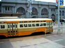 San Francisco Streetcar 1075 Passes the Ferry Building San Francisco Streetcar 1075 Passes the Ferry Building