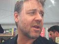 russell crowe talks to la times reporter amy kaufman after receiving his star on the hollywood walk of fame in april 2010.
