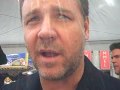 russell crowe talks to la times reporter amy kaufman after receiving his star on the hollywood walk of fame in april 2010.