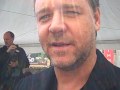 russell crowe talks to la times reporter amy kaufman after receiving his star on the hollywood walk of fame in april 2010.