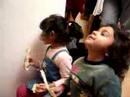 Anvayi & Tanvi Enjoying Indian classical music with Papad